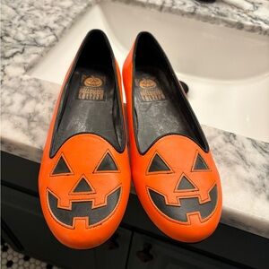 Strangervolt brand purchased from ModCloth. Fun Jack-o-lantern pattern.